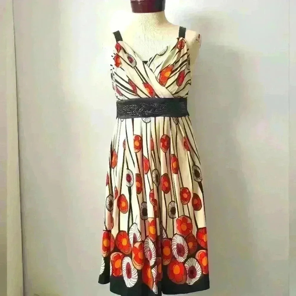 COOSK floral dress  with cream base and black beaded belt and shoulders. Size 2